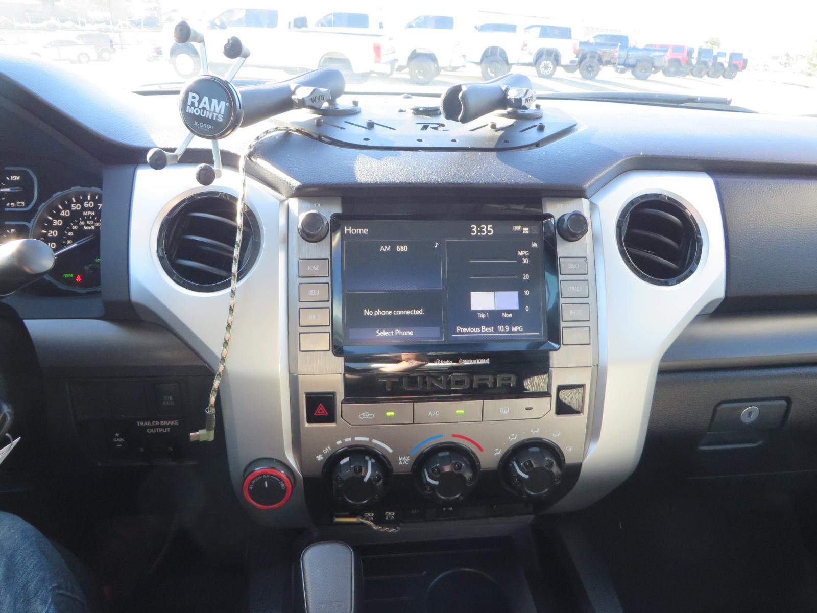 2020 White /GREY Toyota Tundra SR5 (5TFDY5F19LX) with an 5.7L engine, automatic transmission, located at 2630 Grass Valley Highway, Auburn, CA, 95603, (530) 508-5100, 38.937893, -121.095482 - Features - King Off Road adjustable remote reservoir coil overs, King 2.5 adjustable remote reservoir rear shocks, Method Race wheels, Falken Wildpeak tires, Sliders, Bed braces, Borla Exhaust, Husky floor mats, Window tint, and Ram phone mounts. - Photo #22